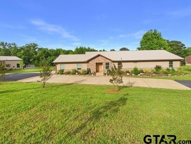 Custom steel-frame home with guest quarters, shop, pool, pond & - photo 2