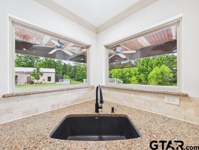Custom steel-frame home with guest quarters, shop, pool, pond & - photo 6