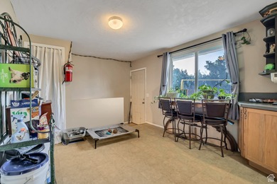 Welcome to this charming West Jordan home featuring 4 spacious