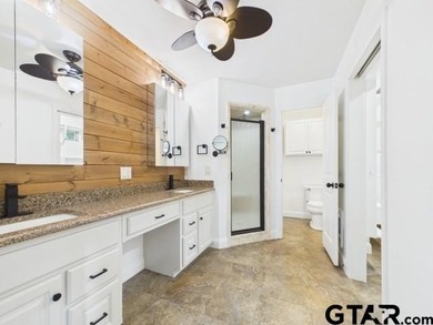 Custom steel-frame home with guest quarters, shop, pool, pond & - photo 10