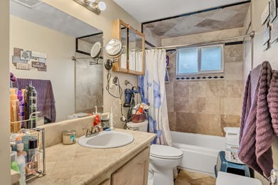 Welcome to this charming West Jordan home featuring 4 spacious