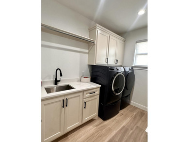 Welcome to this cozy 4-bedroom, 2-bathroom retreat nestled in - photo 12