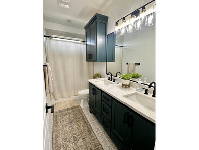 Welcome to this cozy 4-bedroom, 2-bathroom retreat nestled in - photo 13