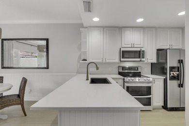 Nestled in the highly sought after Tequesta Oaks community, this - photo 20