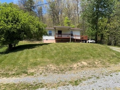 This charming 2-bedroom, 1-bath home offers low-maintenance - photo 1