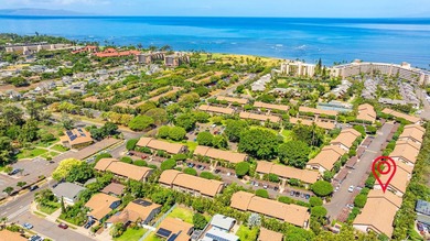 Welcome to Haleakala Gardens 15E, an upstairs corner unit tucked - photo 1
