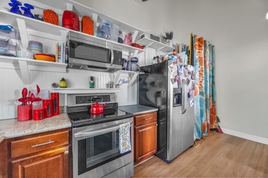 Welcome to Haleakala Gardens 15E, an upstairs corner unit tucked - photo 9