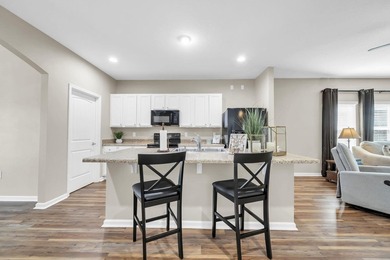 Located in Schooner Landing at Hammock Bay, this 3-bedroom - photo 16