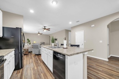 Located in Schooner Landing at Hammock Bay, this 3-bedroom - photo 17
