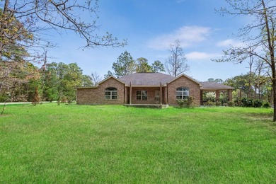 This stunning 3 bedroom, 2 bathroom home in Rayburn Country is - photo 1