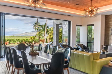 Sunlight and ocean breezes flow through 21 feet of bi-folding - photo 10