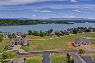 LAKE & MOUNTAIN VIEWS on large lot (.75 acres). Beautiful