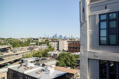 This 1,400 sq.ft. 2 bedroom, 2 bathroom duplex penthouse at - photo 3