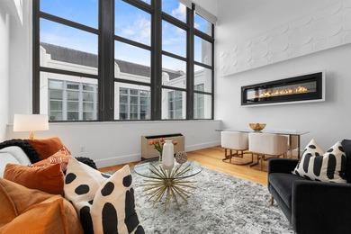 This 1,400 sq.ft. 2 bedroom, 2 bathroom duplex penthouse at - photo 6
