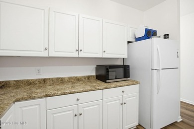 Welcome to 5605 Moss Vine Place -- where coastal charm meets - photo 11