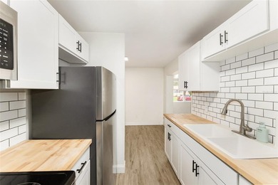 This beautifully updated concrete block home has been - photo 11