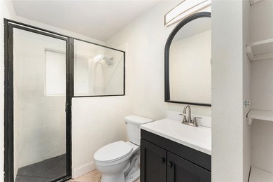 This beautifully updated concrete block home has been - photo 15