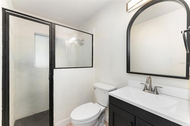 This beautifully updated concrete block home has been - photo 16