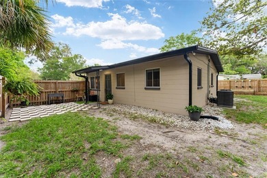 This beautifully updated concrete block home has been - photo 24