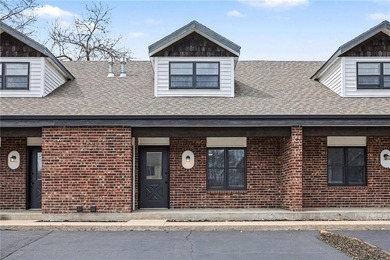 This beautifully updated 1.5-story interior-unit townhome blends - photo 3