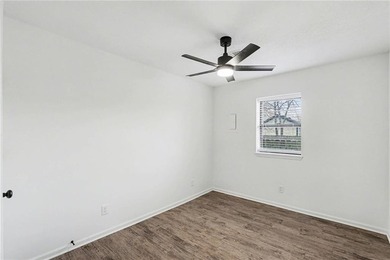 This beautifully updated 1.5-story interior-unit townhome blends - photo 9