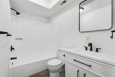 This beautifully updated 1.5-story interior-unit townhome blends - photo 10