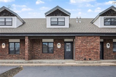 This beautifully updated 1.5-story interior-unit townhome blends - photo 2