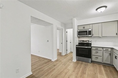 This beautifully updated 1.5-story interior-unit townhome blends - photo 8