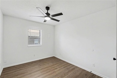 This beautifully updated 1.5-story interior-unit townhome blends - photo 10