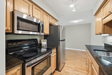 This sunny 1BR/1BA condo includes a heated, underground parking - photo 7