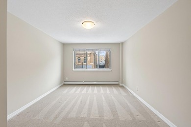 This sunny 1BR/1BA condo includes a heated, underground parking - photo 9