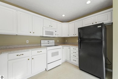 Enjoy low-maintenance living with beautiful golf course views in