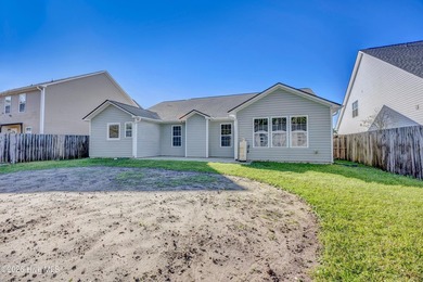 This 3-bedroom, 2-bath home features an expansive family room - photo 22