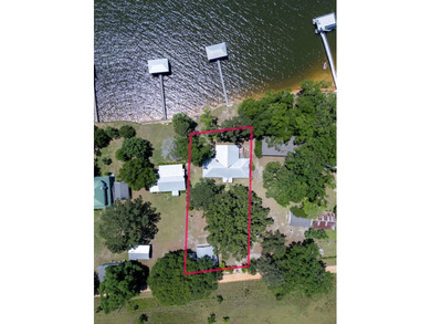 Experience waterfront living at its finest at 64 Poya Point on - photo 25