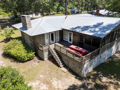 Experience waterfront living at its finest at 64 Poya Point on - photo 32