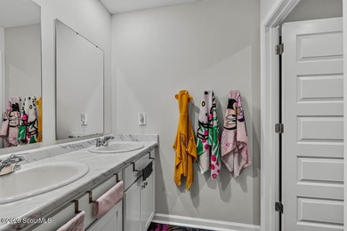 Welcome to 58 Autumns Wood Drive! Built in 2024, this stunning - photo 38