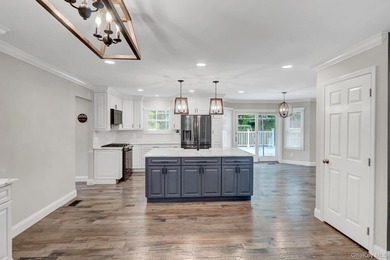 Welcome to 27 4th Ave. Rocky Point, a home that truly checks - photo 8