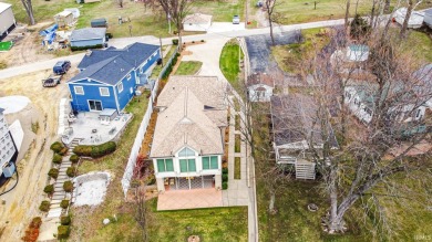 LAKEFRONT LIVING at its FINEST in this CUSTOM-BUILT  home! - photo 4