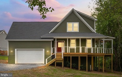 Enjoy elevated lakefront living in this brand-new - photo 7