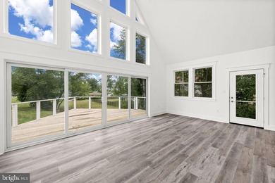 Enjoy elevated lakefront living in this brand-new - photo 10