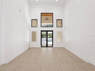 Set within the gates of renowned Isleworth, this beautifully - photo 7