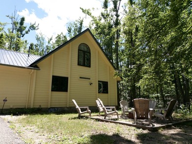 Step into this warm and inviting 3-bedroom, 2-bath chalet - photo 33
