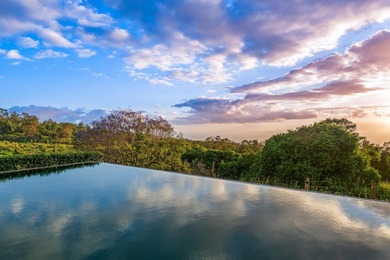 Set on nearly 8 acres of pasture in a gated Kula setting, this - photo 5