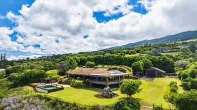 Set on nearly 8 acres of pasture in a gated Kula setting, this - photo 7