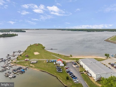 Neatly tucked within the sought-after Noahs Landing community on - photo 2
