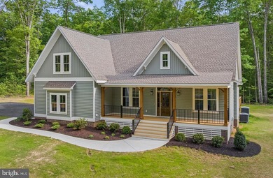 Neatly tucked within the sought-after Noahs Landing community on - photo 5
