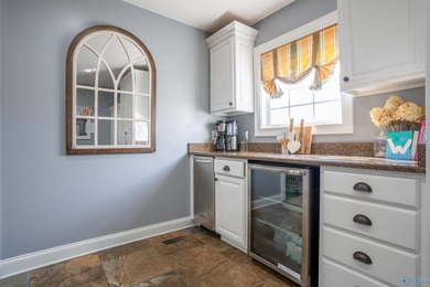 Discover this beautifully remodeled 5,080 sq. ft. home featuring - photo 10
