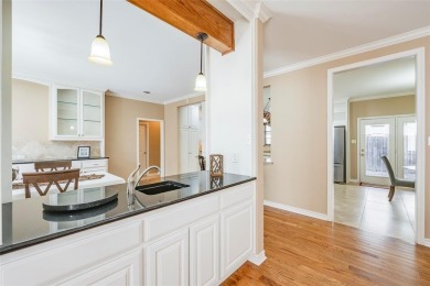 Impeccable custom home offering over 3,580 sq. ft. of timeless