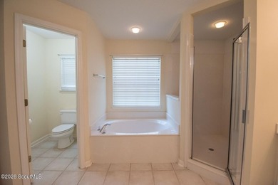 This spacious 5-bedroom, 3-bath home has been freshly painted - photo 11