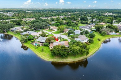 Lake Home For Sale in Palm Beach Gardens, Florida